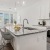 Kitchen with granite countertop island and 