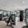 large windows and mirrors brighten spacious fitness center