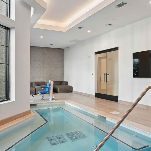 Jacuzzi indoor jacuzzi near wall mounted tv