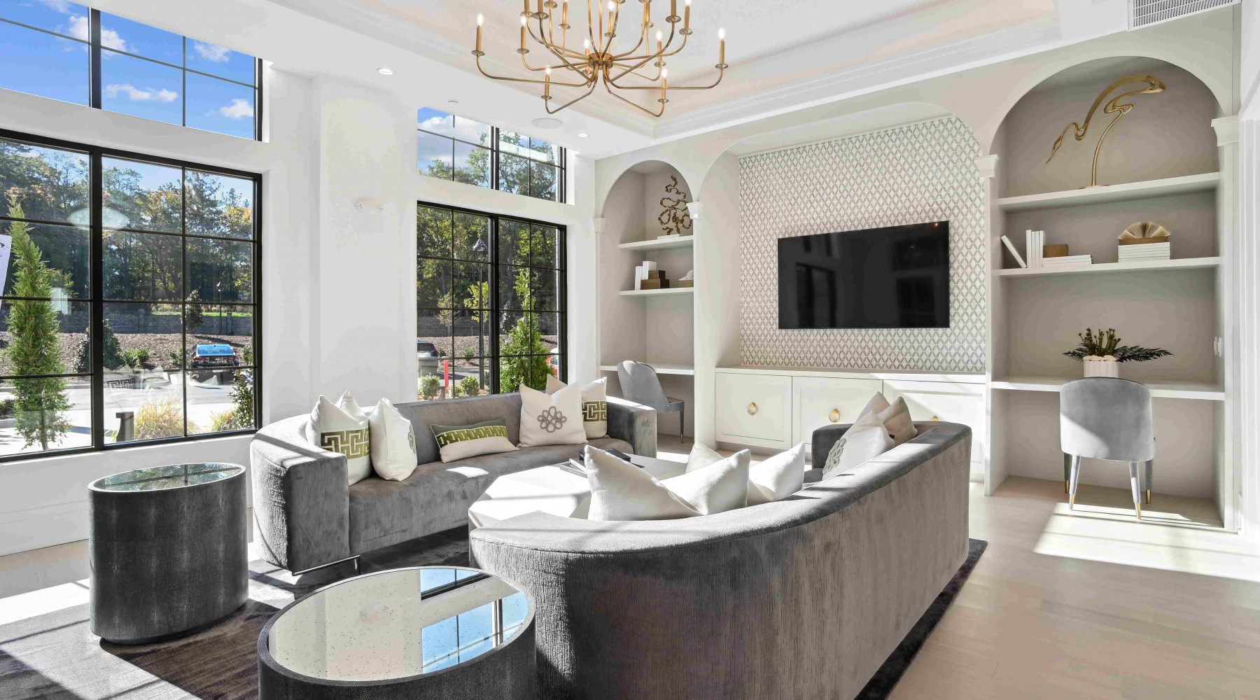 sitting area with couches and bookshelves Reading Room connery providence charlotte nc